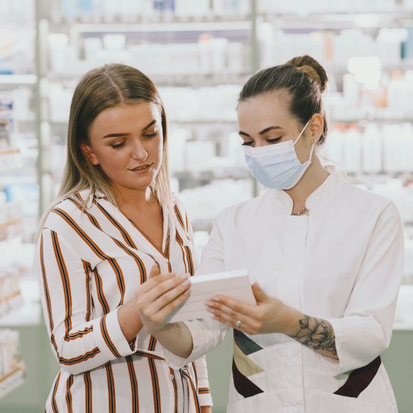 woman-pharmacist-checking-medicine-in-pharmacy.jpg